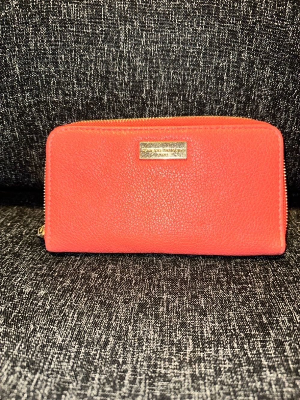 Red zip-around wallet from Adrienne Vittadini Studio.